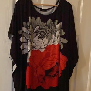 Plus size black (with flower print) bat sleeve blouse.